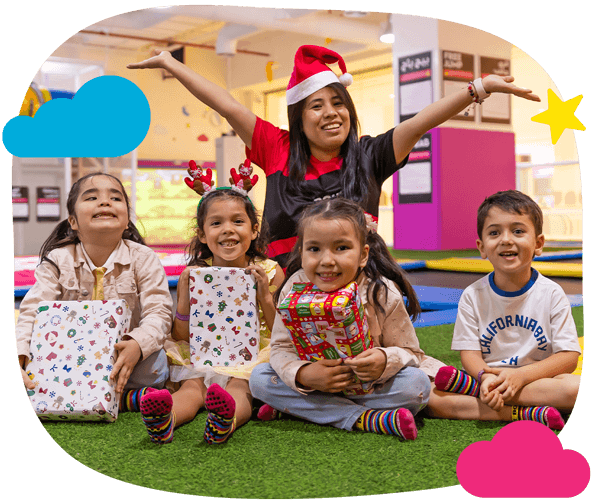 children receiving gifts at minibounce 12 Days of Giveaways