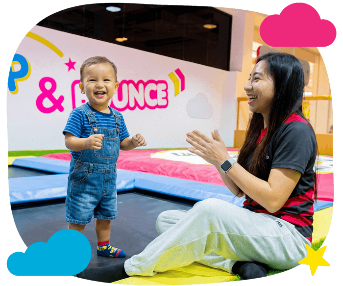 Child playing with host at miniBOUNCE Motor City in Dubai