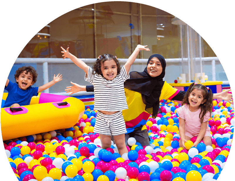kids playing in the ballpit with minibounce host at fun fest
